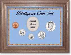 1973 Birth Year Coin Gift Set with a blue background and dark oak frame THUMBNAIL