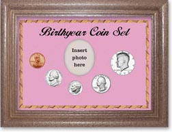1973 Birth Year Coin Gift Set with a pink background and dark oak frame THUMBNAIL