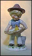 Boy Carrying Eggs, Goebel Lore Blumenkinder Figurine  #11287-13 MAIN
