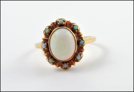 Large Center Opal and Eight Tiny Opals Ring in 10K Yellow Gold MAIN