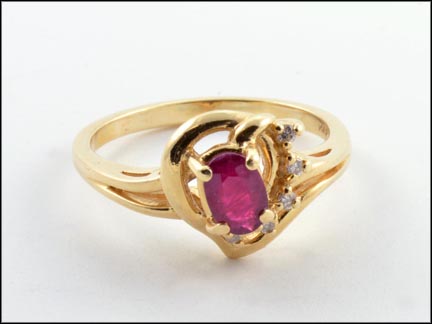 Oval Ruby and Diamond Accents Ring in 14K Yellow Gold MAIN