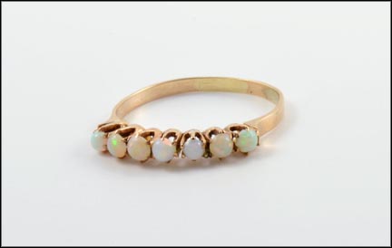 Round Opal Seven-Stone Ring in Yellow Gold MAIN