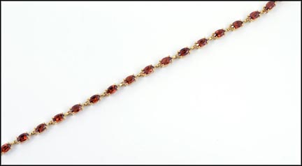 Oval Garnet Link Bracelet in 10K Yellow Gold LARGE