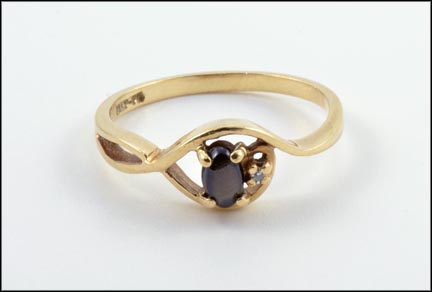 Black Star Sapphire Ring in 10K Yellow Gold MAIN