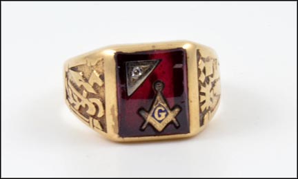 Masonic ring deals with red stone