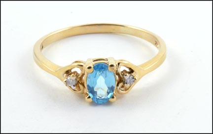 Oval Blue Topaz Ring in 10K Yellow Gold MAIN