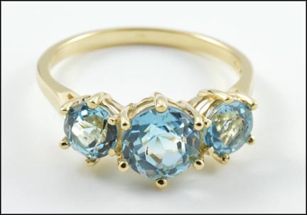 3 Stone Blue Topaz Ring in 10K Yellow Gold MAIN