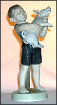August, Boy With Piglet, Royal Copenhagen Figurine #4530 MAIN