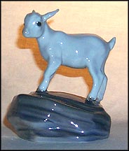 Kid On Stone, Royal Copenhagen Figurine #4760 MAIN