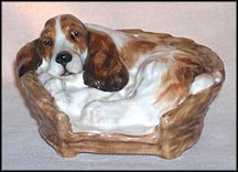 Cocker Spaniel Lying In Basket MAIN