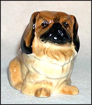 Pekinese, seated MAIN