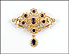 Oval and Round Cut Garnet Brooch in 14K Yellow Gold THUMBNAIL