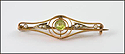 1903 Round Peridot Brooch in 9K Yellow Gold THUMBNAIL