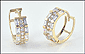 Cubic Zirconia Huggie Earrings in 14K Yellow Gold THUMBNAIL