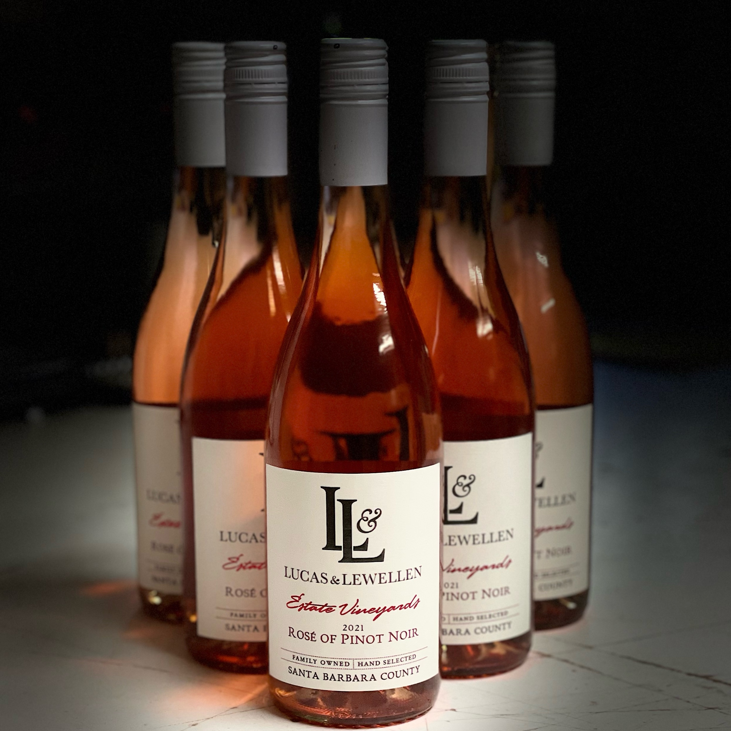 Six bottles of pink 2021 Lucas & Lewellen Rosé to represent our end of vintage case pricing of $175 MAIN