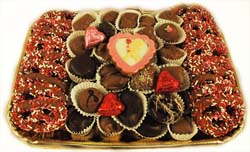 Large party tray laden with Pretzels, hand-crafted chocolates and hand painted piece THUMBNAIL