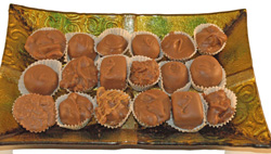 Assorted Chocolates on Glass Candy Tray THUMBNAIL