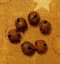 Homespun Elegance - Merry Noel Collection - Avery's Cycling Santa Rusty Bell 1/4" MAIN
