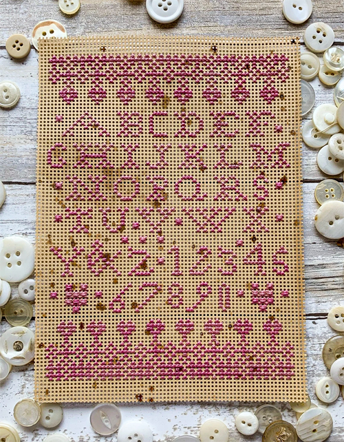 lucy beam love in stitches cross stitch pink paper sampler cross stitch