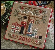 Little House Needleworks - 2010 Ornament #10 - Under The Tree THUMBNAIL