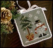 Little House Needleworks - 2010 Ornament #3 - He's A Flake THUMBNAIL