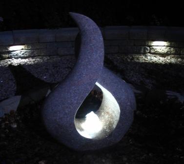 Carved Stone Flame at Night